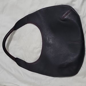 Salvatore Ferragamo black leather hobo bag.